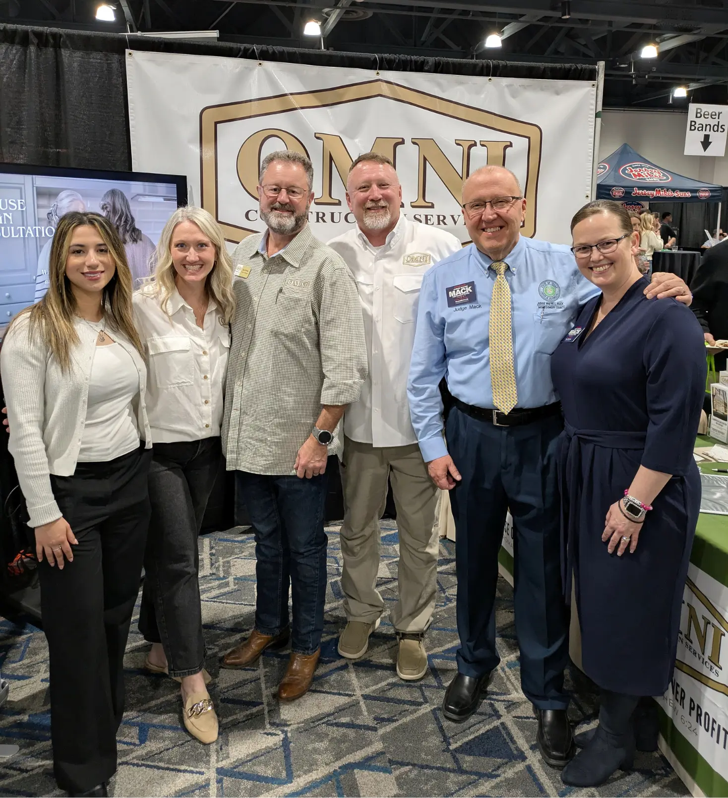 The OMNI Construction Services team at their booth